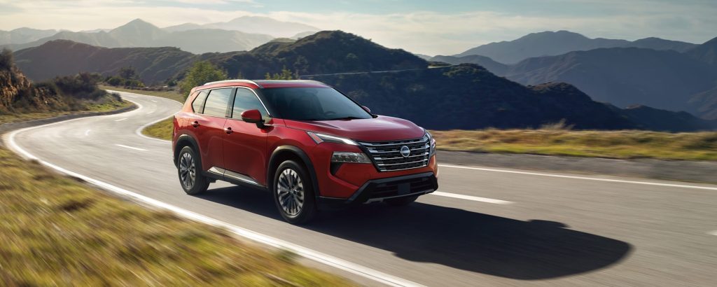 Red 2026 Nissan Rogue on road