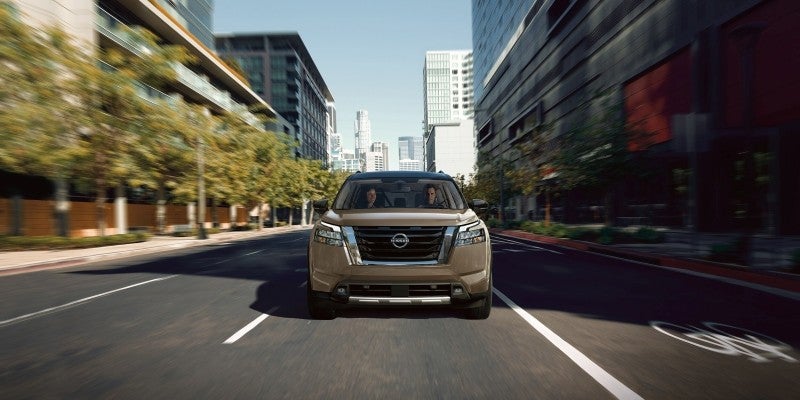 2024 Nissan Pathfinder Rock Creek driving on a road
