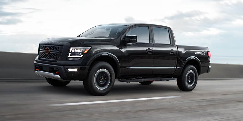 2024 Nissan Titan driving on a road