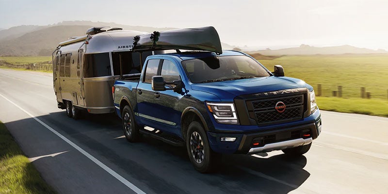 2024 Nissan Titan towing a trailer